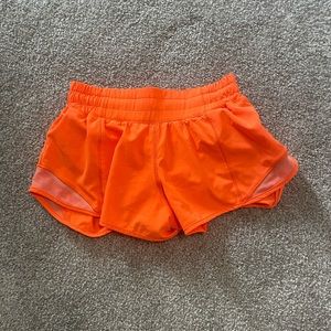 Lululemon Highlight Orange Hotty Hot Shorts 2.5 inch, Size 2,